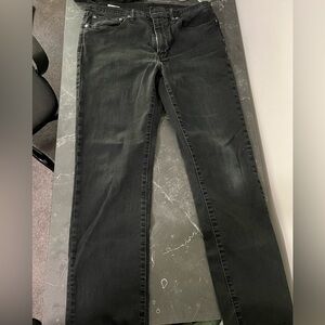 Levi jeans black color. 34W 34L. Straight leg fit